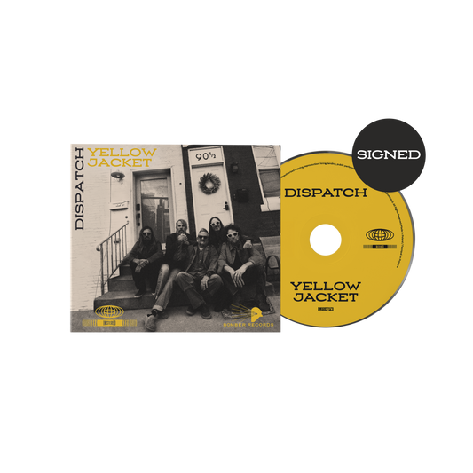 Signed CD cover art featuring a black and white photograph of the Dispatch band members with a 'Yellow Jacket' CD in front.